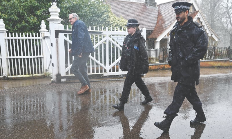 Police officials walk near the Royal Lodge, a property on the estate surrounding Windsor Castle and a former residence of Andrew Mountbatten-Windsor, a day after he was released following his arrest on Thursday. —Reuters Police officials walk near the Royal Lodge, a property on the estate surrounding Windsor Castle and a former residence of Andrew Mountbatten-Windsor, a day after he was released following his arrest on Thursday. —Reuters