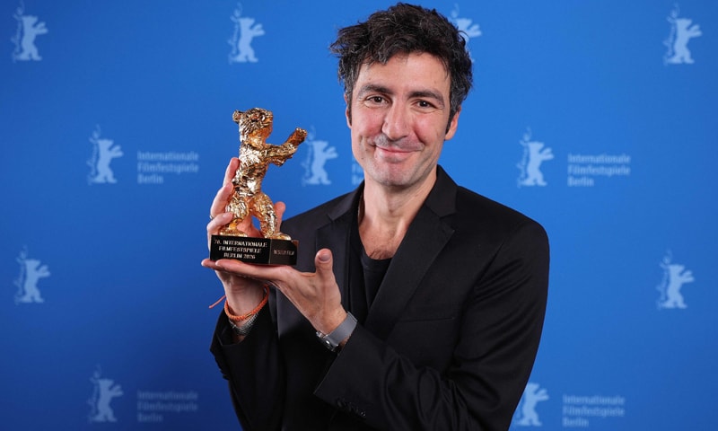 Ilker Catak poses with the Golden Bear for Best Film.&mdash;AFP