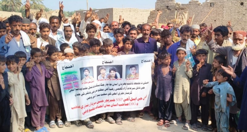 VILLAGERS protest demolition of their homes.—Dawn