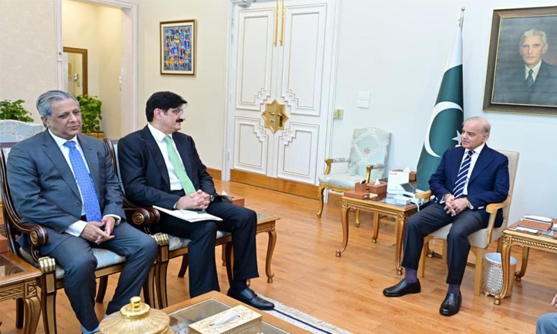 Prime Minister Shehbaz Sharif speaks to Sindh CM Murad Ali Shah in Islamabad on Wednesday.&mdash;Dawn