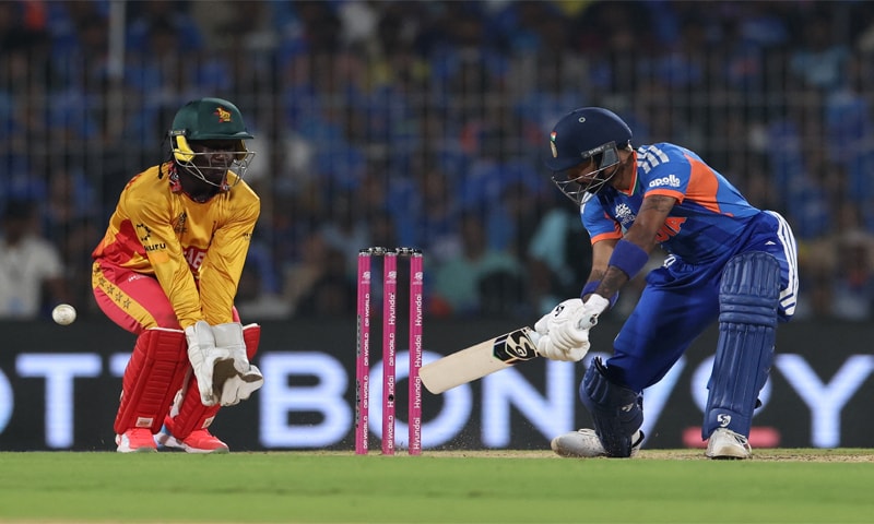 CHENNAI: Indian batter Hardik Pandya plays a shot as Zimbabwe wicket-keeper Tadiwanashe Marumani reacts during their Super Eights match at the M.A. Chidambaram Stadium on Thursday.&mdash;Reuters