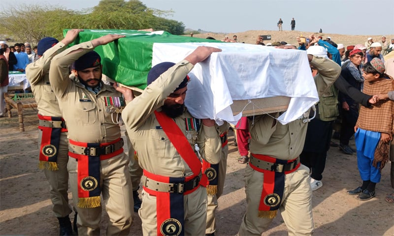 Pakistani soldiers carry the coffin of a security official who was martyred in terrorist attacks in Kohat.&mdash;AFP
