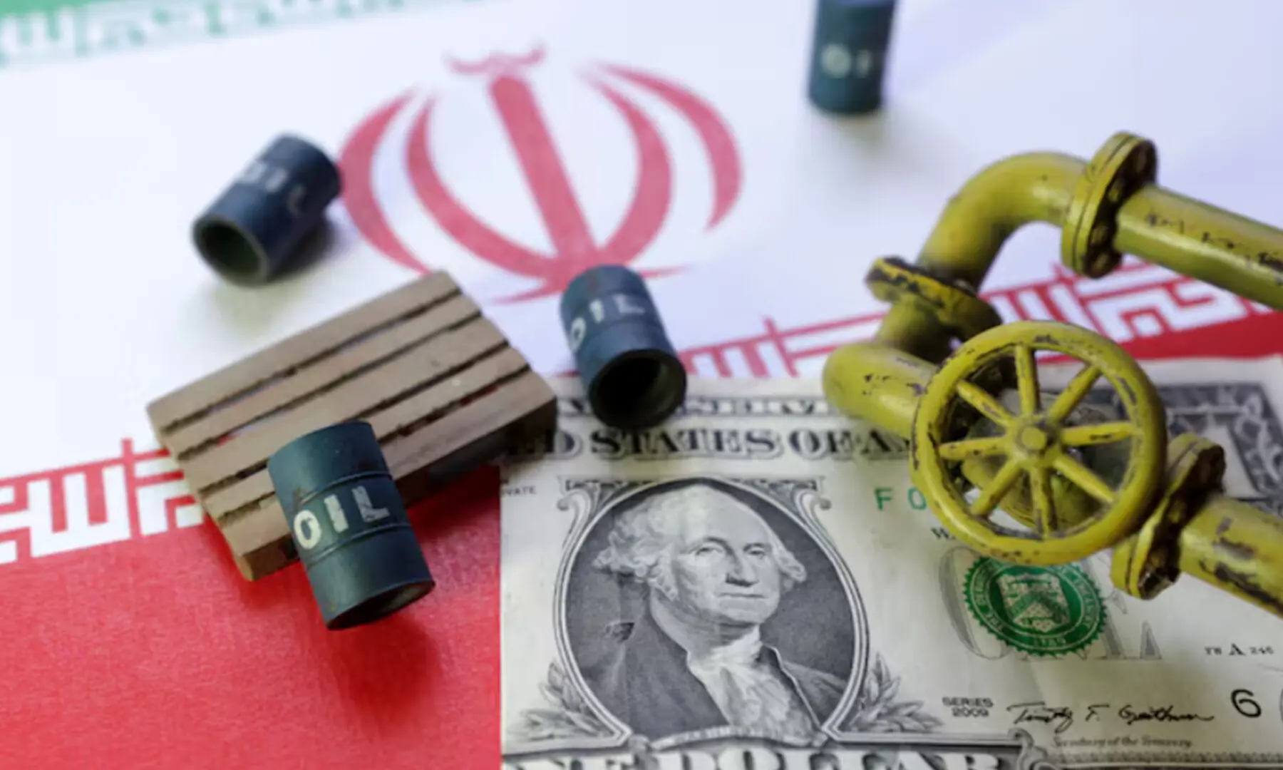Iranian flag, a U.S dollar banknote and minatures of oil pipes and barrels are seen in this illustration taken June 23, 2025. Reuters. File Iranian flag, a U.S dollar banknote and minatures of oil pipes and barrels are seen in this illustration taken June 23, 2025. Reuters. File