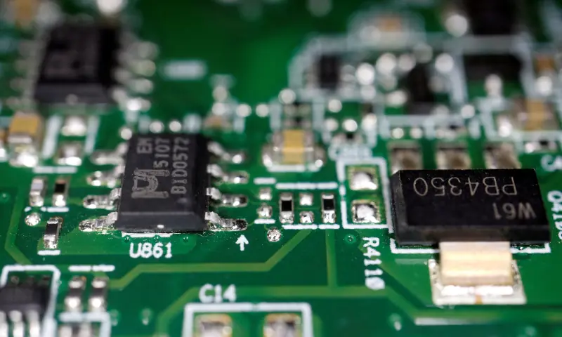 Semiconductor chips are seen on a printed circuit board in this illustration picture taken on February 17, 2023. &mdash; Reuters/File