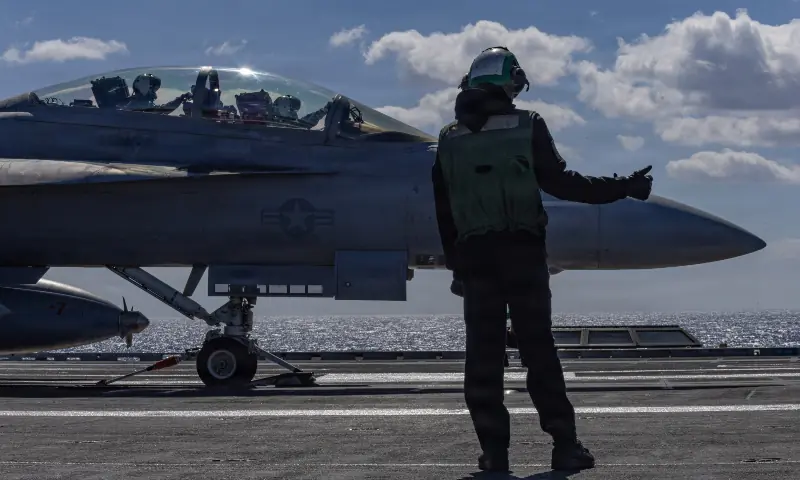 A US Navy sailor signals for the launch of an F/A-18F Super Hornet aircraft, attached to Strike Fighter Squadron 213, from the U.S. Navy aircraft carrier USS Gerald R. Ford, while operating in support of the Operation Epic Fury attack on Iran from an undisclosed location on February 28, 2026. &mdash; Reuters