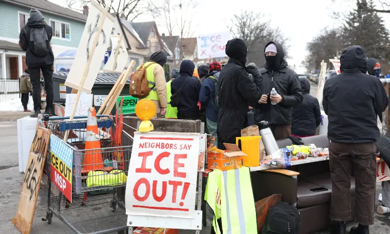 Protesters against US Immigration and Customs Enforcement (ICE) gather materials such as dumpsters and wooden palettes on the middle of the street as they prepare to block ICE vehicles in Minneapolis, Minnesota, US on February 7, 2026. &mdash; Reuters