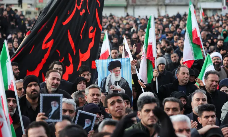People react as they gather at the Enghelab Square, after Iran&rsquo;s Supreme Leader Ayatollah Ali Khamenei was killed in Israeli and US strikes on Saturday, in Tehran, Iran on March 1, 2026. &mdash; Reuters