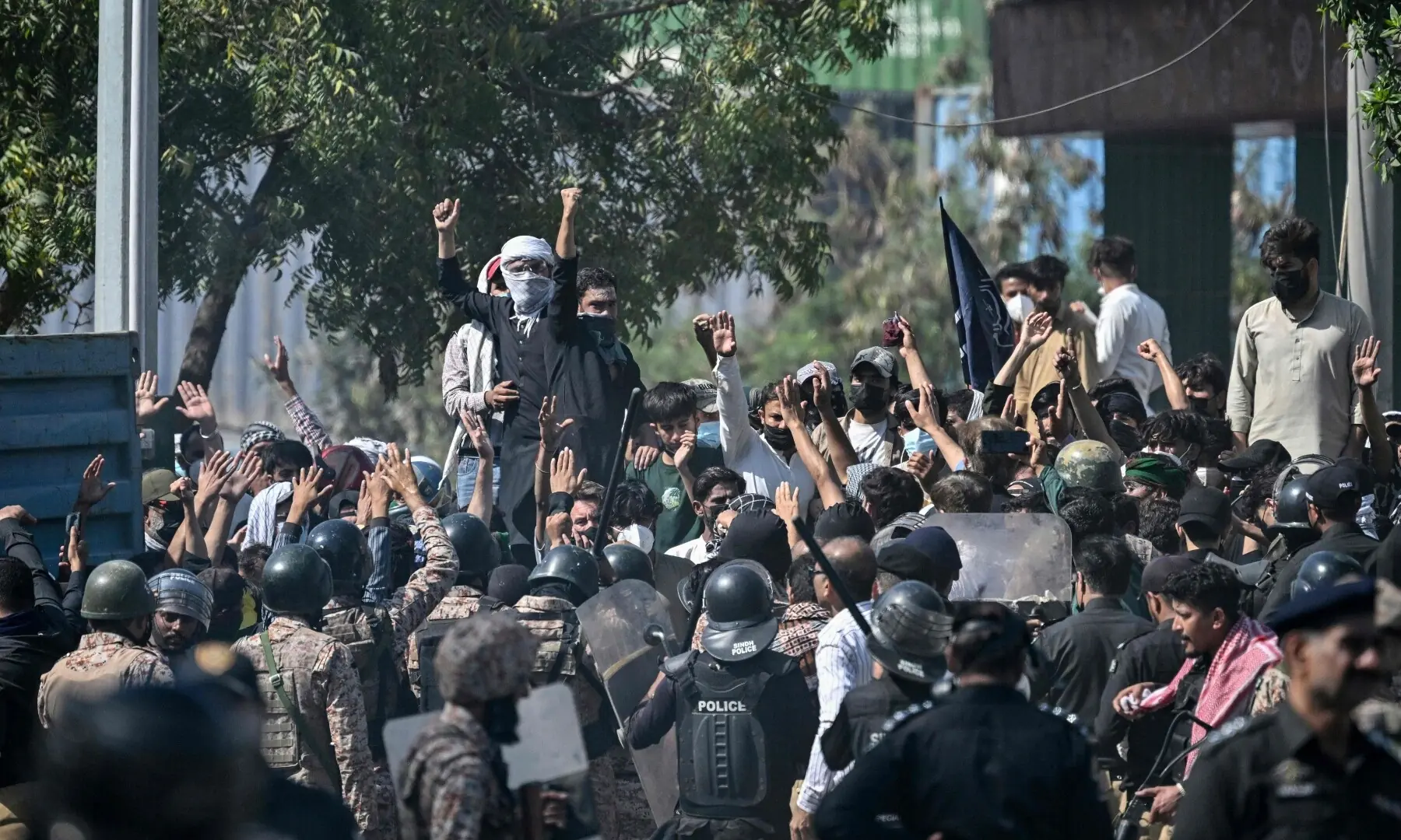 Protesters shout slogans during a protest as they attempt to storm the US consulate in Karachi on March 1, 2026. &mdash; AFP