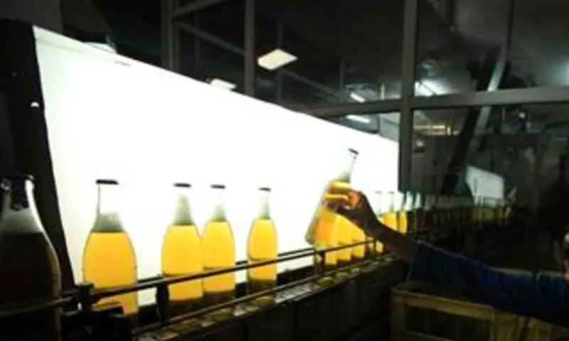 A worker at Pakistan&rsquo;s lone beer maker, Murree Brewery, checks the quality of bottles at the factory in Rawalpindi on Nov 10, 2012. &mdash; Reuters/File