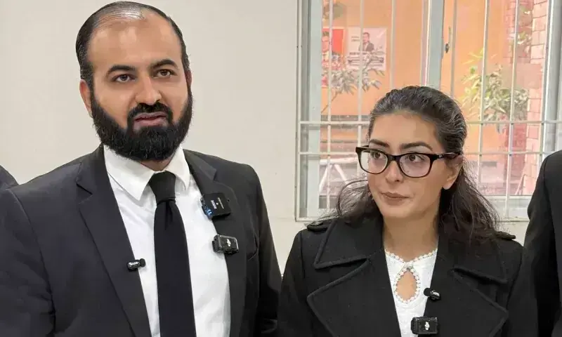 This picture taken on Dec 5, 2025 shows human rights lawyer Imaan Mazari (R) with her husband and fellow lawyer Hadi Ali Chattha (L), during a court hearing in Islamabad. &mdash; AFP/File