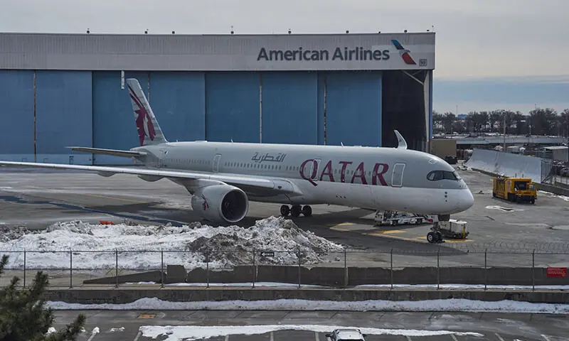 A Boeing 777-300ER aircraft operated by Qatar Airways is parked outside the American Airlines cargo terminal at John F Kennedy International Airport in New York City on March 2, the US, amid the US-Israel conflict with Iran. &mdash; Reuters