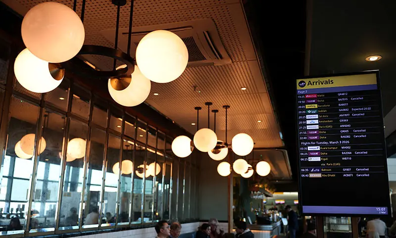 A departure board displays cancelled flights to Middle East countries amid the US-Israel conflict with Iran, at Heathrow Airport Terminal 4, in London, the UK on March 2. &mdash; Reuters