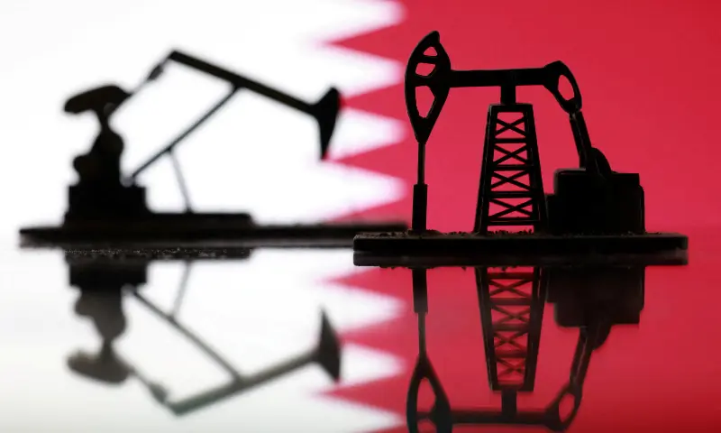 3D-printed oil pump jacks and a Qatar flag appear in this illustration taken March 2, 2026. — Reuters