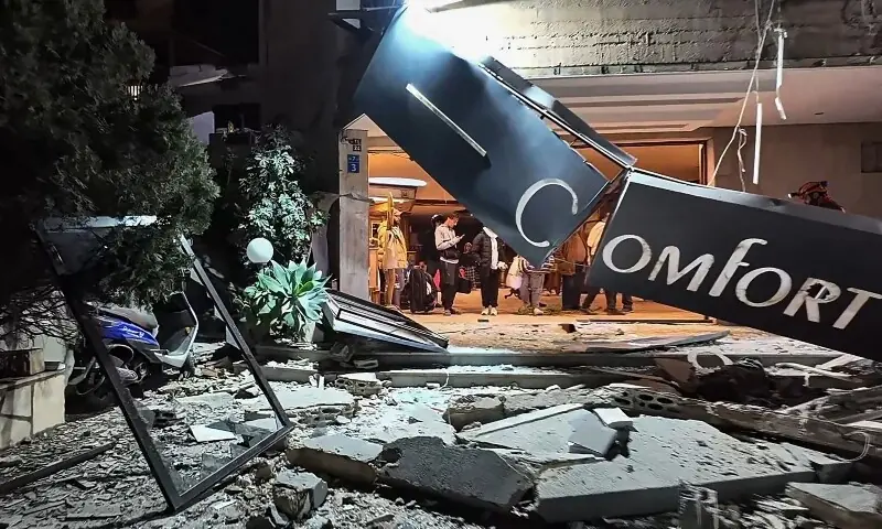 This frame grab from AFPTV video footage taken on March 4, 2026 shows first responders inspecting the damage at Comfort Hotel after it was hit by an Israeli strike in Beirut&rsquo;s eastern suburb of Hazmieh. &mdash;AFP