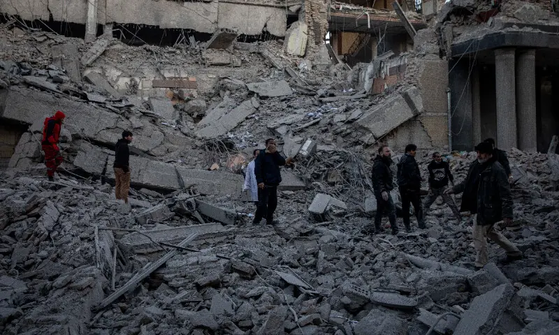 People stand in rubble at the site of an Israel and US strike on a police station in Tehran, Iran, March 3, 2026. — Reuters People stand in rubble at the site of an Israel and US strike on a police station in Tehran, Iran, March 3, 2026. — Reuters