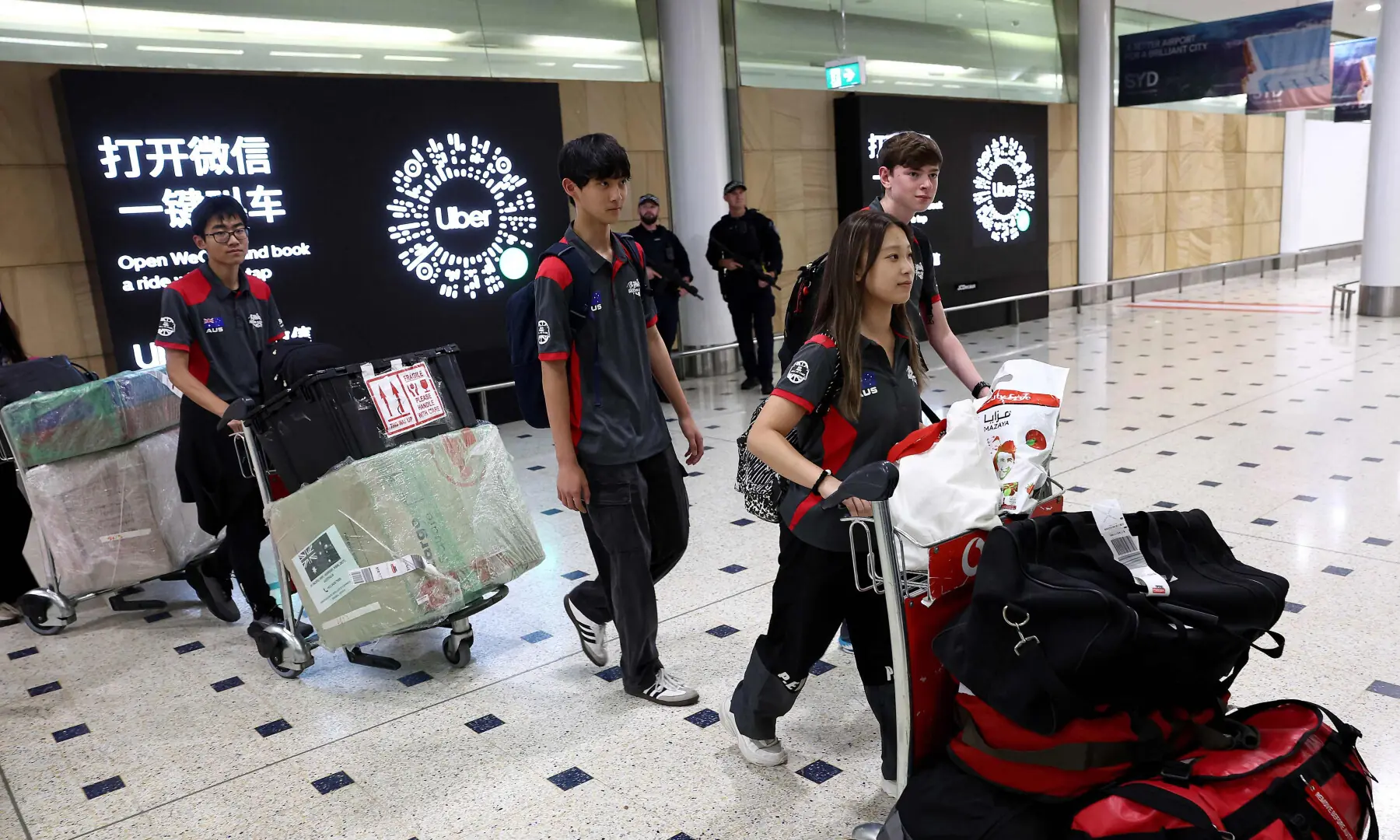  Passengers arrive from a Dubai flight at Sydney Kingsford Smith International Airport on March 4, 2026. &mdash; AFP 
