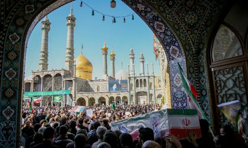 Mourners in the city of Qom attend the funeral of those killed in the US-Israeli war with Iran on March 5. &mdash; AFP