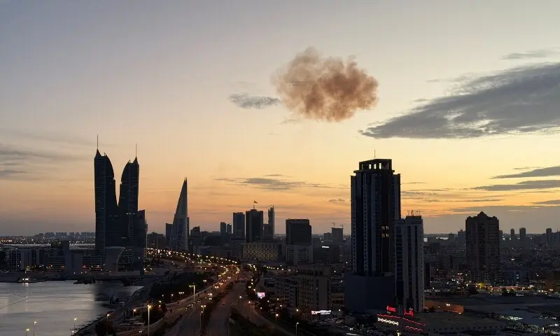 Smoke rises after an Iranian drone was intercepted over the Bahrain Financial Harbour towers, which houses the Israeli embassy, in Manama, Bahrain, March 6, 2026. &mdash;Reuters