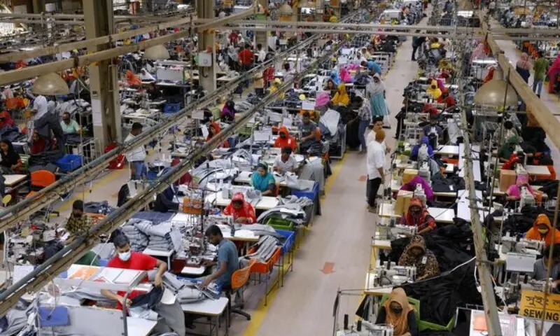 Bangladeshi garment workers make clothes in the sewing section of a factory in Gazipur, Bangladesh on April 9, 2025. &mdash; Reuters/File