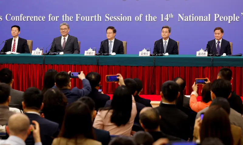 China Securities Regulatory Commission (CSRC) Chairman Wu Qing, Chinese Commerce Minister Wang Wentao, National Development and Reform Commission (NDRC) Chairman Zheng Shanjie, Chinese Finance Minister Lan Foan and People&rsquo;s Bank of China (PBOC) Governor Pan Gongsheng attend a press conference on the sidelines of the National People&rsquo;s Congress (NPC), in Beijing, China on March 6, 2026. &mdash; Reuters
