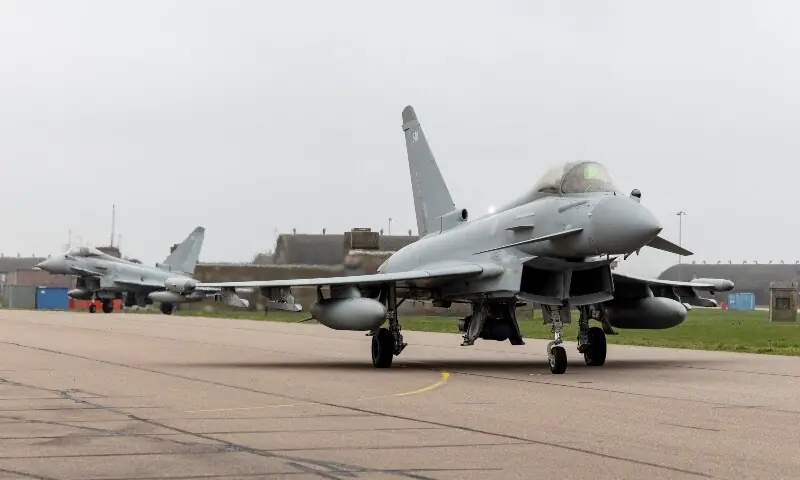 An RAF Typhoon fighter jet departs RAF Coningsby for Qatar, in Lincolnshire, the UK on March 6, &mdash; Reuters