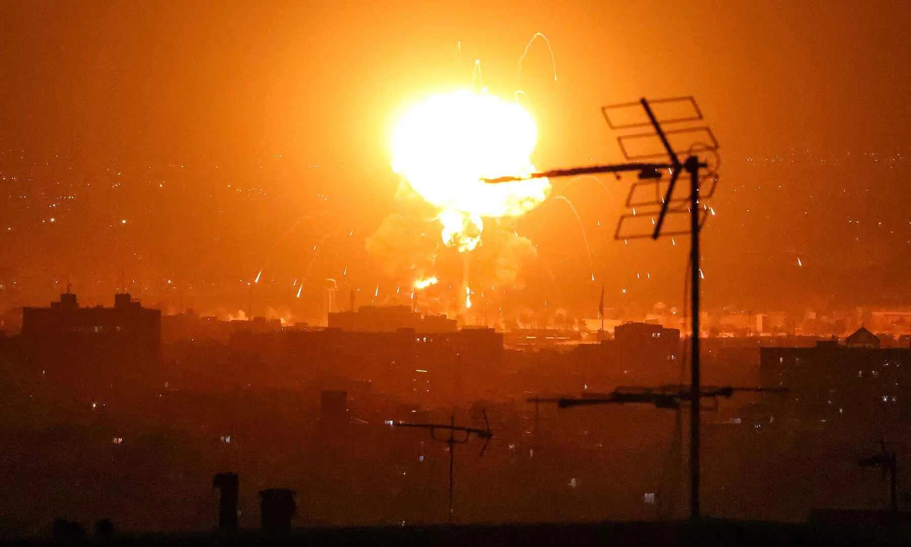 Explosions erupt following strikes on an oil refinery in Tehran, Iran on March 7. &mdash; AFP