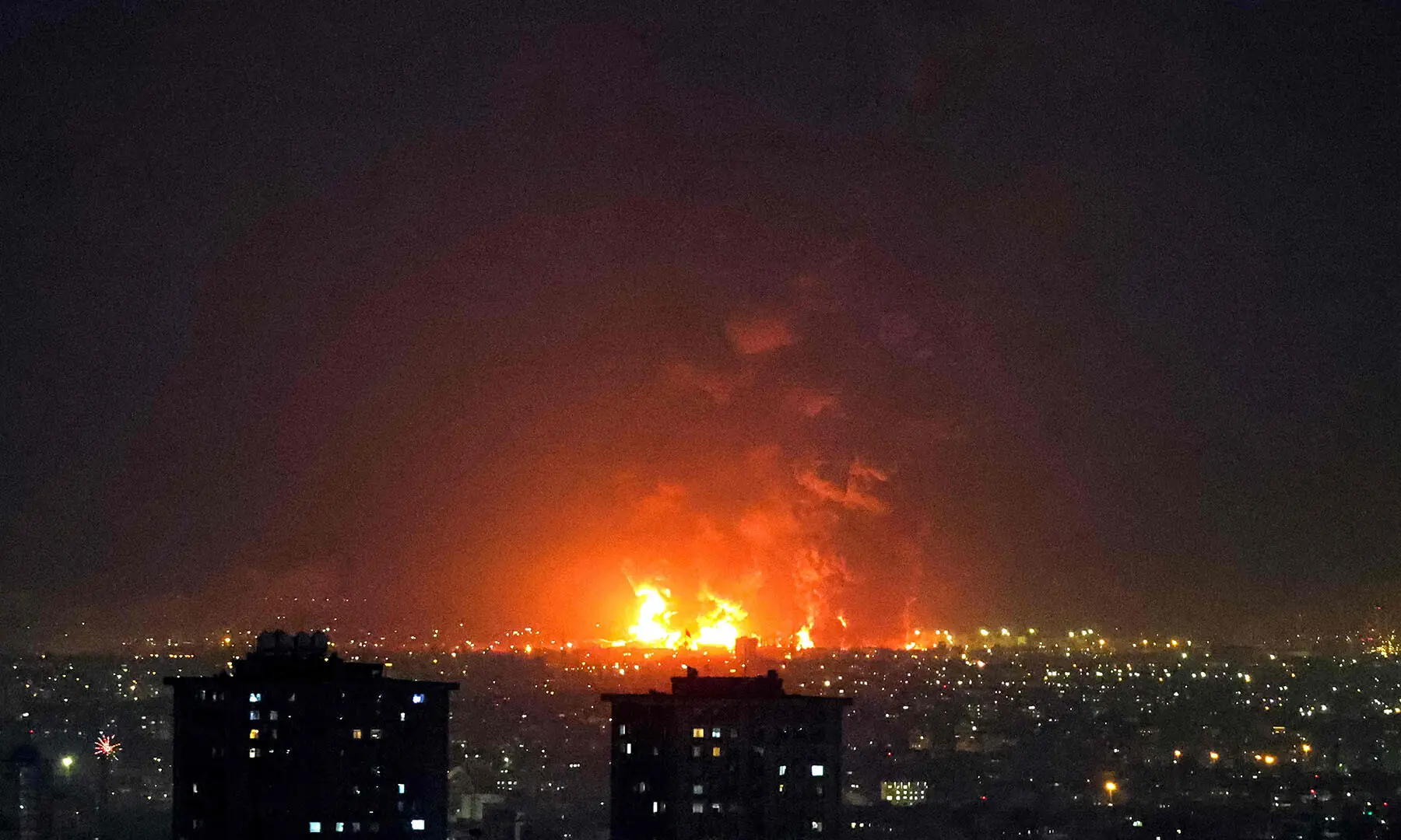 Explosions erupt following strikes at Tehran Oil Refinery in Tehran, Iran on March 7. &mdash; AFP