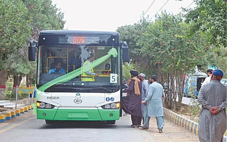 QUETTA: Passengers board the newly-launched Green Bus on Monday.—APP QUETTA: Passengers board the newly-launched Green Bus on Monday.—APP
