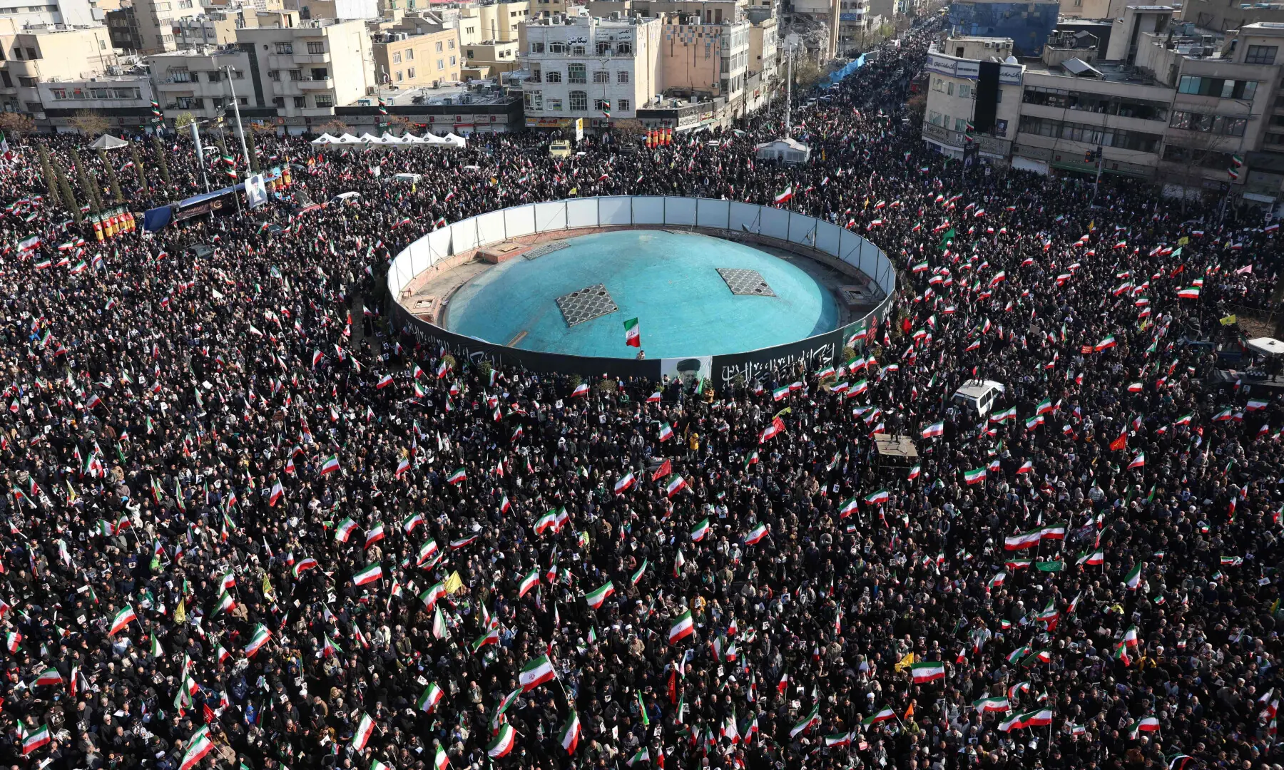 Demonstrators wave Iranian national flags as they gather for a rally in support of the new Supreme Leader at Enghelab Square in central Tehran on March 9, 2026. &mdash; AFP