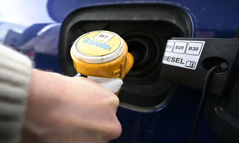 A motorist takes diesel fuel pump to fill up his car at a fuel station in Tint&eacute;niac, western France on March 9, as oil prices around the world rise amid the US-Israeli conflict with Iran. &mdash; AFP