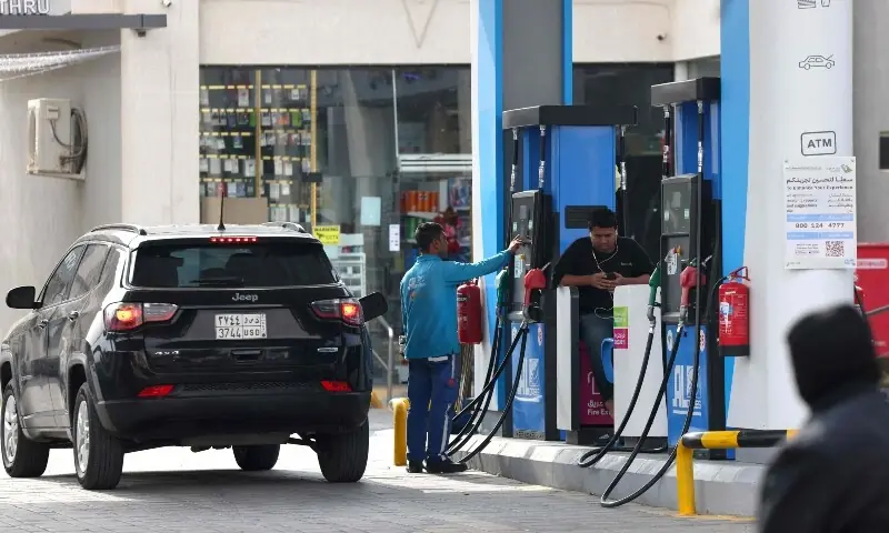 An attendant works at a petrol station in the Saudi capital Riyadh on March 9, as oil prices around the world rise amid the US-Israeli conflict with Iran. &mdash; AFP