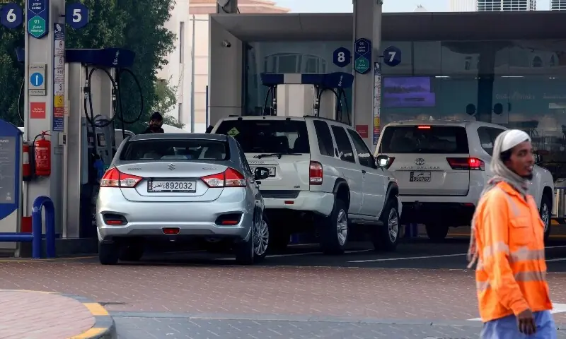 Drivers stop at a petrol station to fill their vehicle in the Qatari capital Doha on March 9, as oil prices around the world rise amid the US-Israeli conflict with Iran. &mdash; AFP