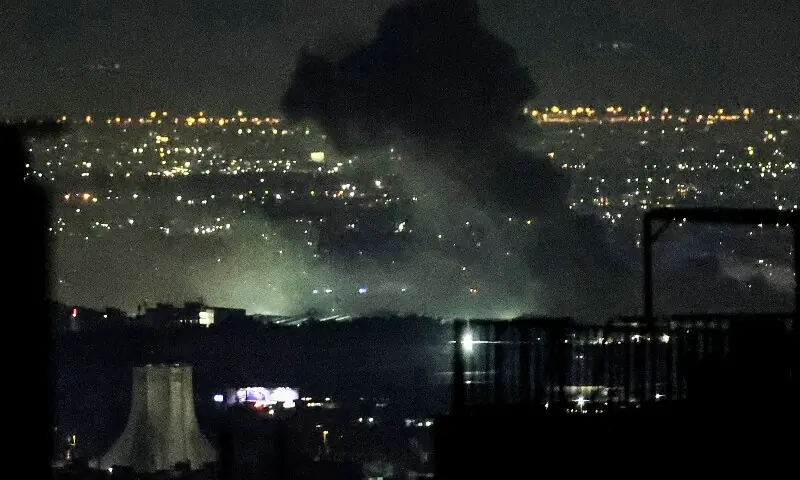 Smoke plumes billow from the site of airstrikes near Azadi Tower in western Tehran on March 10, 2026. &mdash;AFP