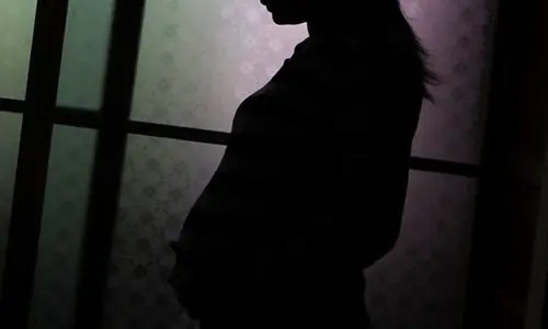 A file photo showing a pregnant woman in silhouette. &mdash; AFP/File
