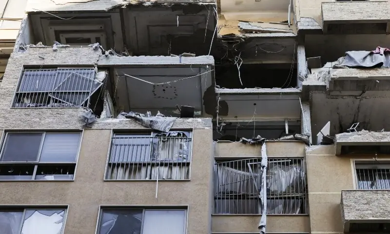 A damaged apartment building in the aftermath of an Israeli strike, in central Beirut, Lebanon, March 11, 2026. &mdash;Reuters