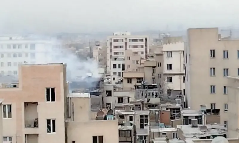 Smoke rises from a building following a reported strike, amid the US-Israeli conflict with Iran, in Tehran, Iran in this screen grab obtained from social media video released March 11, 2026.