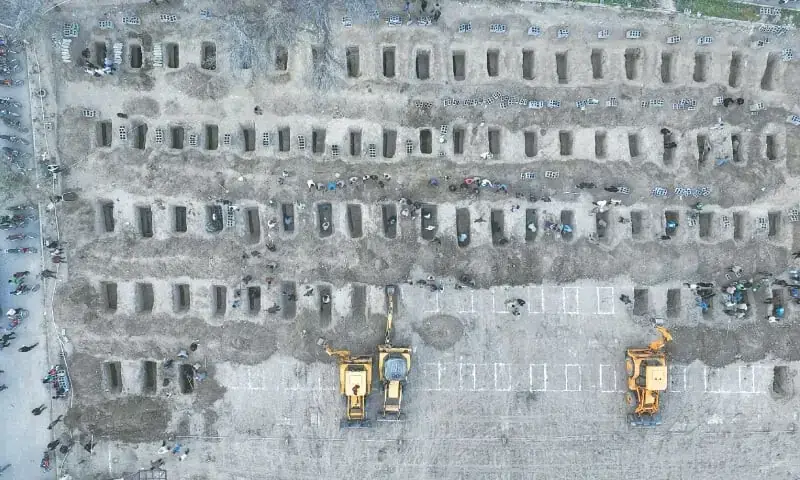 This aerial handout picture, released by the Iranian Press Centre on Tuesday, shows mourners digging graves for children killed in a US-Israeli strike on a primary school in Minab city of Iran&rsquo;s Hormozgan province.&mdash;AFP/ File