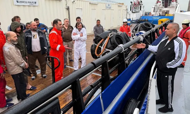 Iraq&rsquo;s director general of the General Company for Ports Farhan al-Fartousi interacts with rescued crew members from the fuel tanker Zephyros, who are aboard an Iraqi vessel following an apparent attack on the tanker in Iraqi waters, according to port and maritime security sources, amid the US-Israeli conflict with Iran, at the port of Faw, Basra province, Iraq, March 12, 2026. &mdash;Reuters
