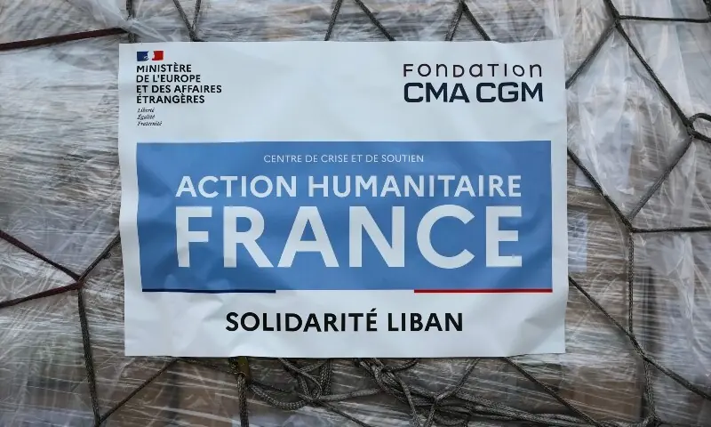 Humanitarian aid with a label which reads &ldquo;Humanitarian Action France: Solidarity Lebanon&rdquo; is gathered on the tarmac to be loaded into an aircraft destined for Lebanon at Roissy-Charles de Gaulle Airport on the outskirts of Paris on March 12, 2026. &mdash;AFP