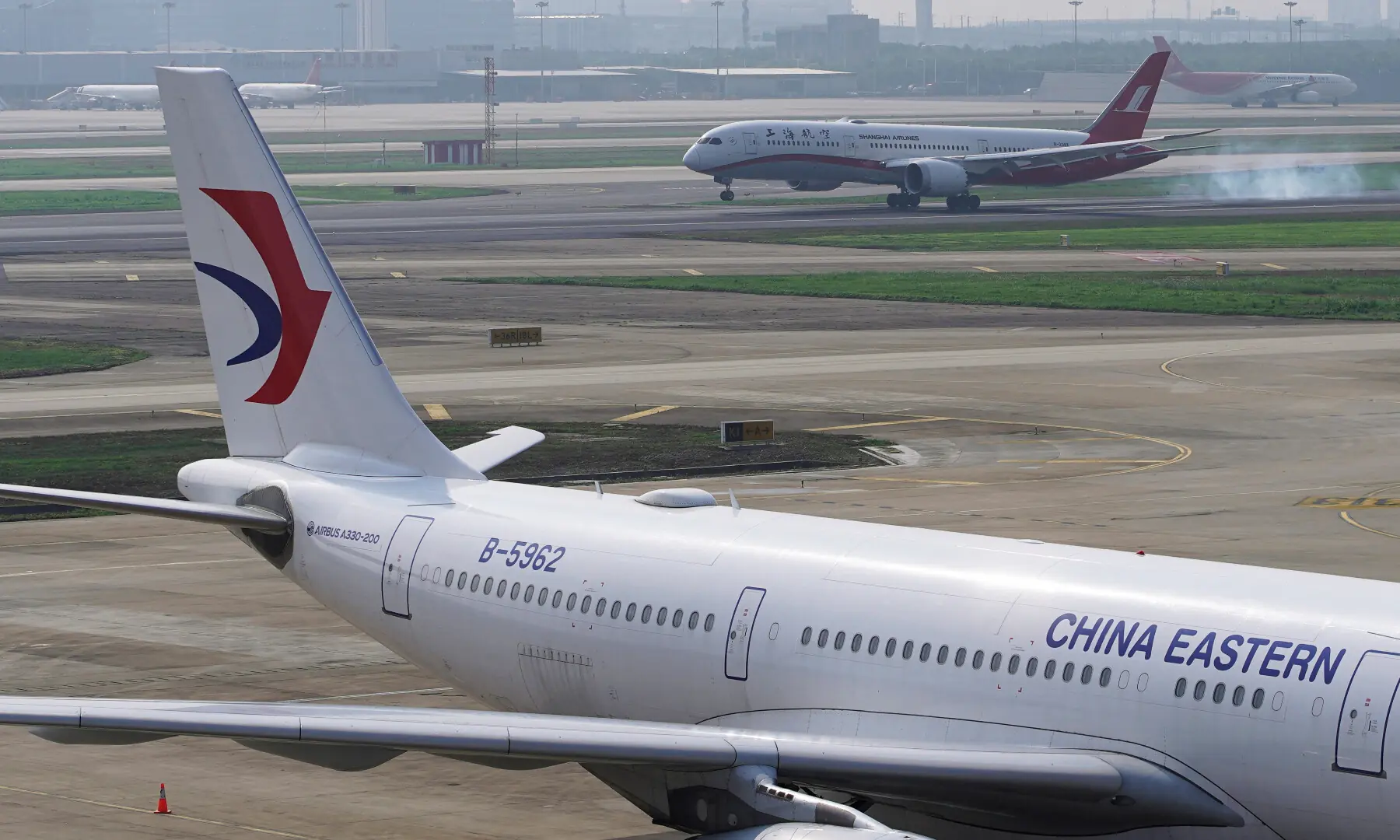 A China Eastern Airlines aircraft and a Shanghai Airlines aircraft are seen in Hongqiao International Airport in Shanghai, following the Covid-19 outbreak, China on June 4, 2020. &mdash; Reuters
