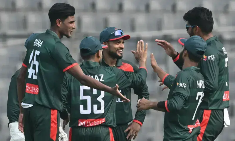Bangladesh&rsquo;s Nahid Rana (L) celebrates with teammates after taking the wicket of Pakistan&rsquo;s Shamyl Hussain during the first one-day international (ODI) cricket match between Bangladesh and Pakistan at Sher-e-Bangla National Stadium in Mirpur on March 11, 2026. &mdash; AFP