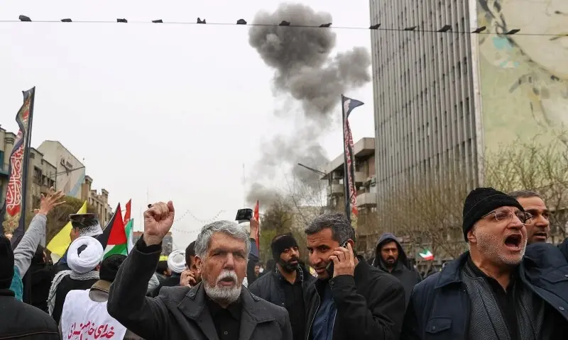 Smoke rises following an explosion during a protest marking the annual al-Quds Day (Jerusalem Day) on the last Friday of the holy month of Ramadan, amid the U.S.-Israeli conflict with Iran, in Tehran, Iran, March 13. &mdash; Reuters