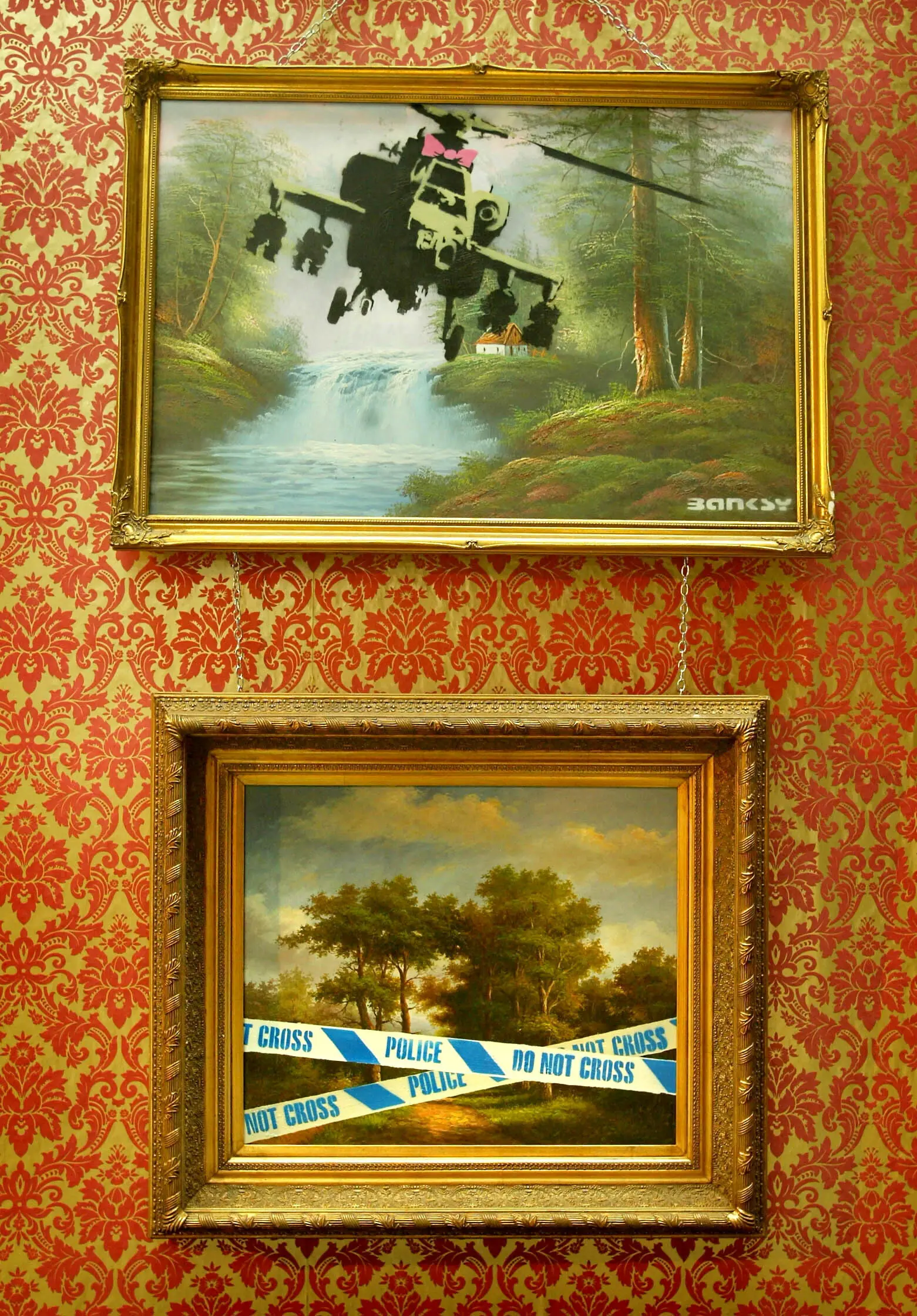 Paintings from Banksy&rsquo;s &lsquo;Crude Oils&rsquo; series. Photo: Reuters