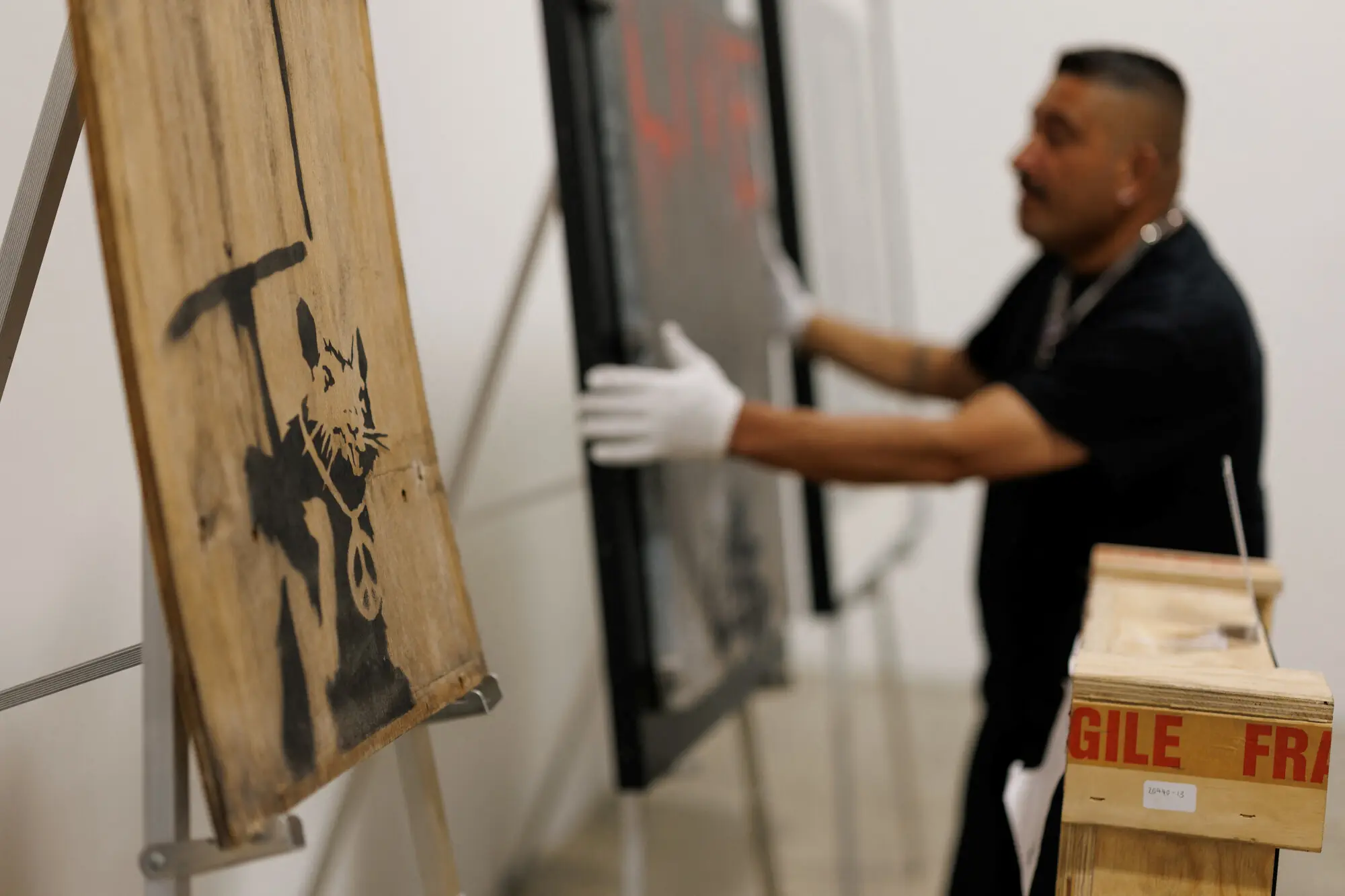 Banksy&rsquo;s work being set up for display in the US. Photo: Reuters.
