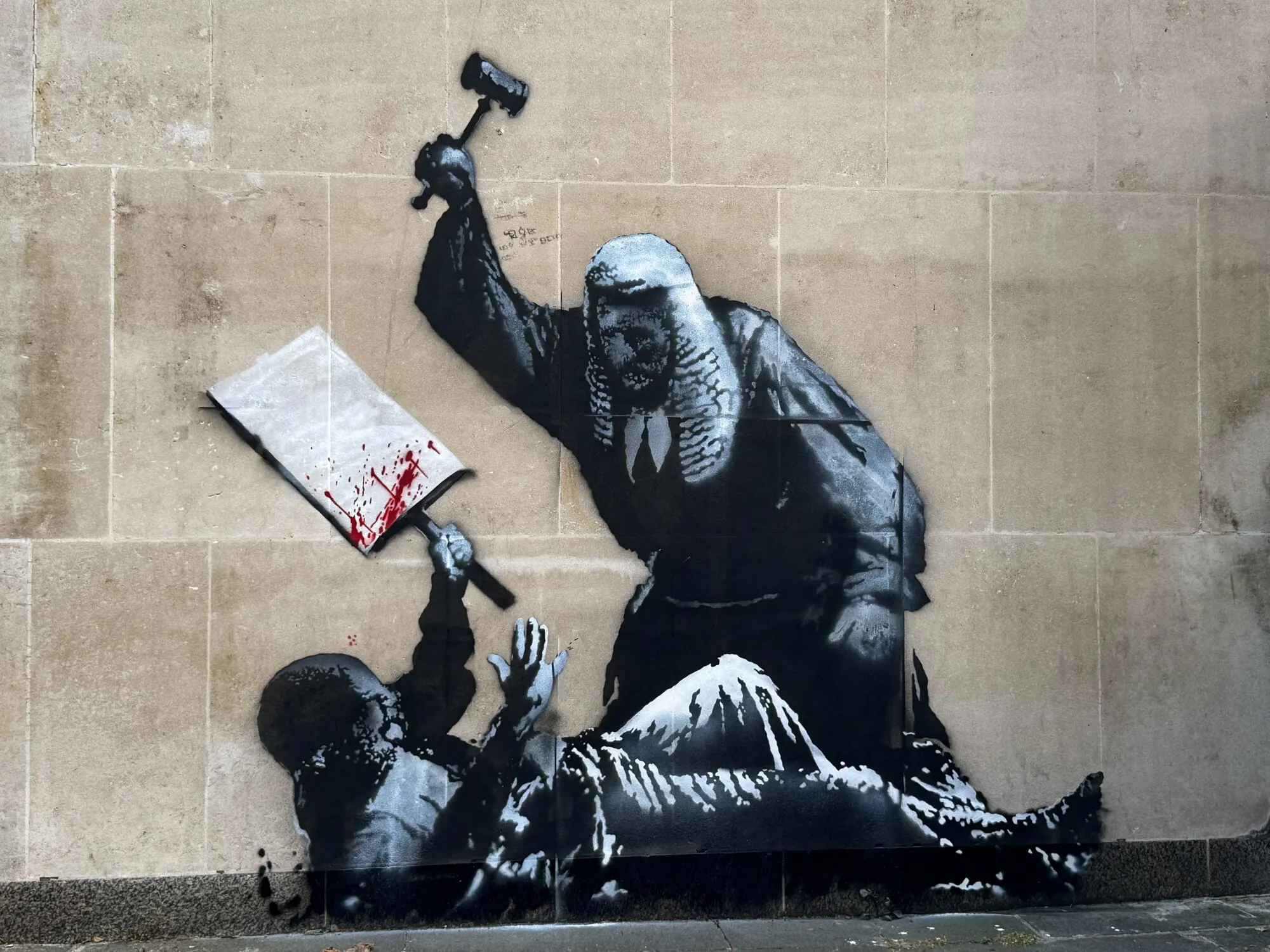 In September, Banksy stencilled a piece outside London&rsquo;s Royal Courts of Justice. Photo: Reuters