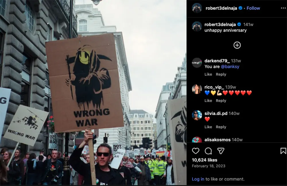  Massive Attack frontman Robert Del Naja posted himself protesting with a Banksy placard, fuelling rumours. Photo: Robert Del Naja/Instagram 