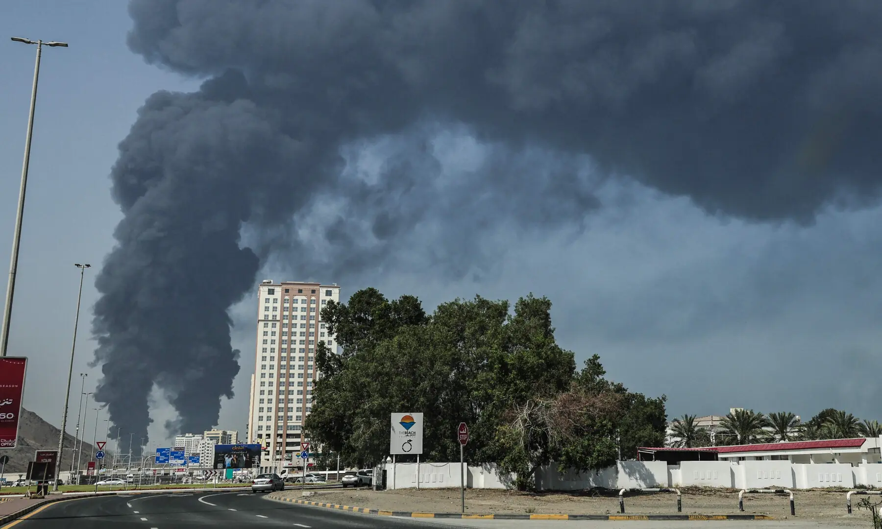 Smoke rises from the direction of an energy installation in the Gulf emirate of Fujairah on March 14, 2026. &mdash; AFP