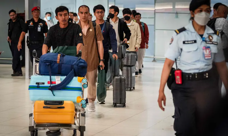Thai crew members of the bulk carrier Mayuree Naree arrive at Suvarnabhumi International Airport after a flight from Oman, in Bangkok on March 16, 2026. — AFP