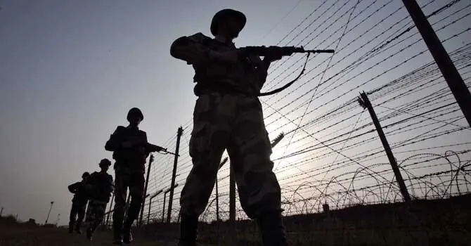 Indian Border Security Force (BSF) soldiers patrol the fenced border with Pakistan in Suchetgarh, southwest of Jammu January 16, 2013. — Reuters/File Indian Border Security Force (BSF) soldiers patrol the fenced border with Pakistan in Suchetgarh, southwest of Jammu January 16, 2013. — Reuters/File