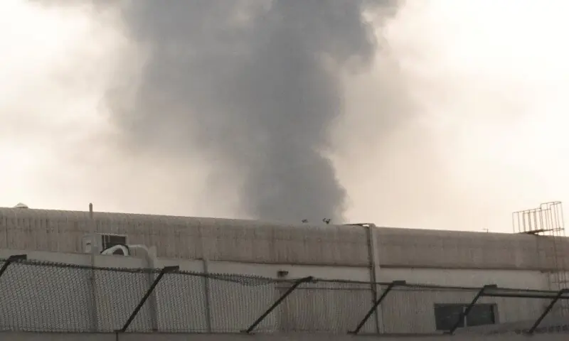 Smoke rising from the Dubai International Airport is seen through the windshield of a vehicle, after a drone attack hit a fuel tank, according to Dubai authorities, amid the US-Israel conflict with Iran, in Dubai, United Arab Emirates, March 16, 2026. &mdash;Reuters
